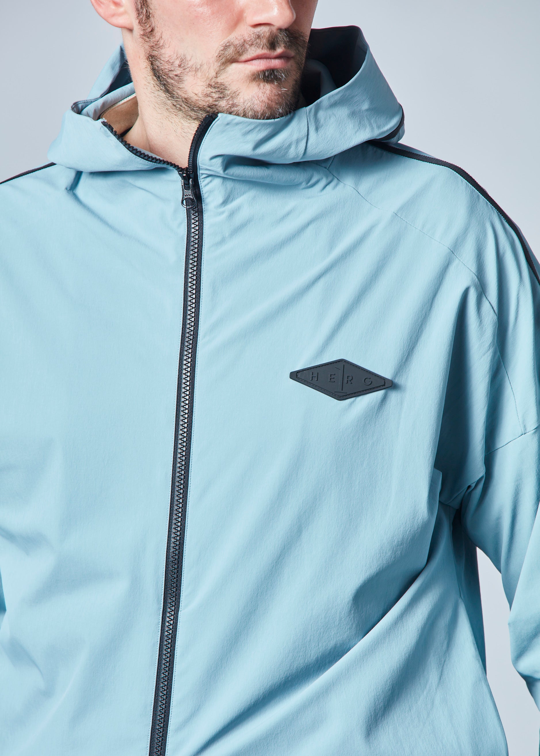 【NEW】ストレッチナイロンラインフーディジップアップ